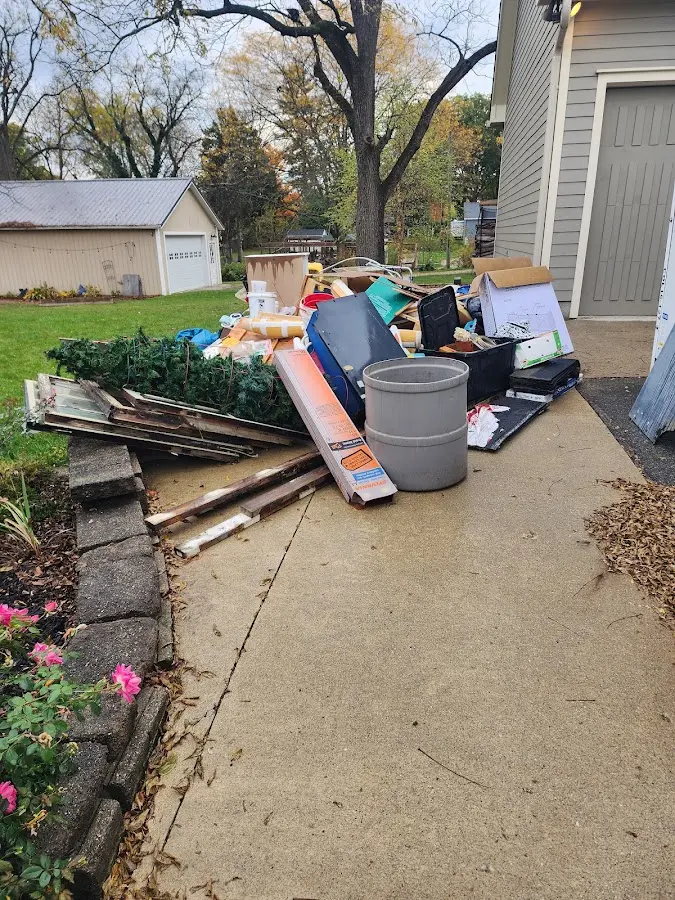 Dumpster being loaded with debris for Commercial Dumpster Rental in Thonotosassa